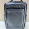 Genuine black leather laptop backpack with padded straps and side pockets Genuine black leather laptop backpack with padded straps and side pockets