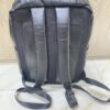Genuine black quilted leather backpack with padded mesh straps