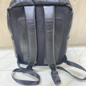Genuine black quilted leather backpack with padded mesh straps