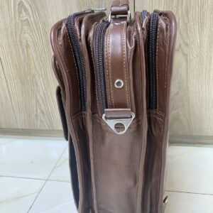 Genuine brown leather multi-pocket backpack with lock closure and adjustable straps