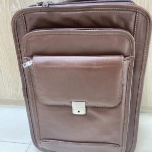 Genuine brown leather multi-pocket backpack with lock closure and adjustable straps